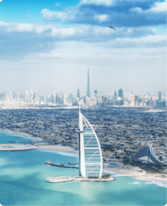 View of Dubai with Burj Al Arab and skyline in the background.