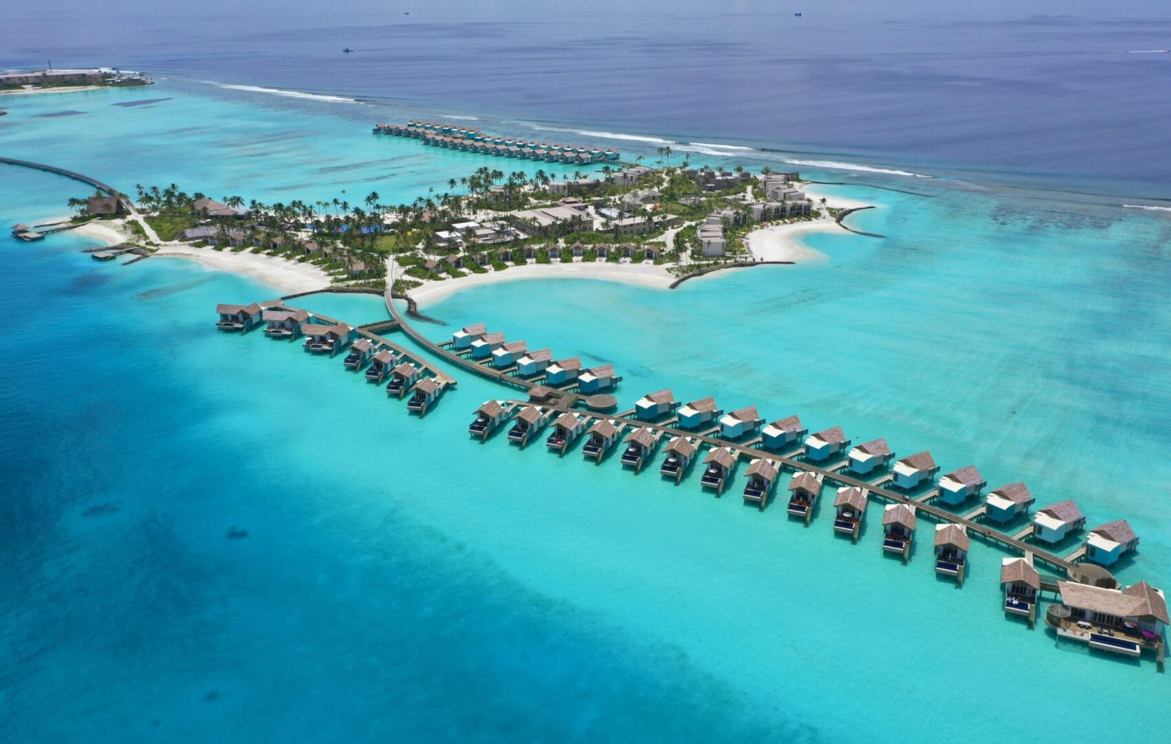 HRHM-Aerial-WaterBungalows-Island-scaled-1